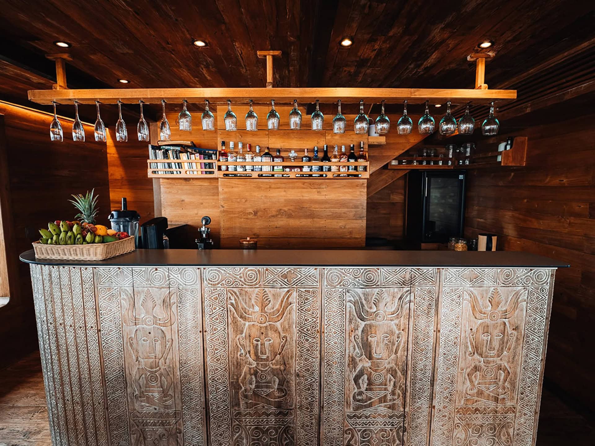 On Board 2 oracle-yacht-phinisi-hand-carved-bar-interior-liveaboard-indonesia